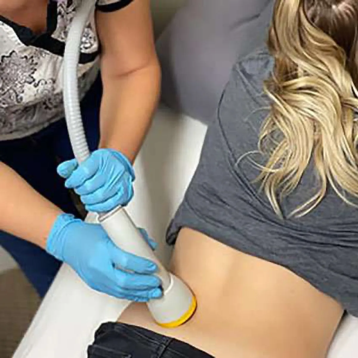 SoftWave therapy being applied to patient at Tradition Family Chiropractic in Port St. Lucie
